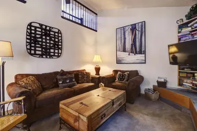 a living room with a couch and a coffee table at Cc301 Cross Creek Condo in Frisco