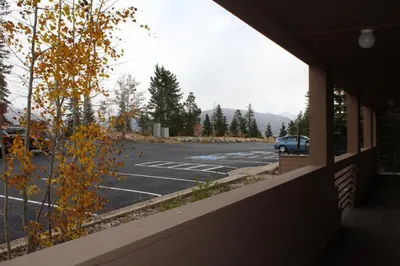a parking lot with a car parked in it at 522 Watch Hill Condo in Silverthorne