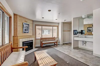 a living room with a couch and a fireplace at 522 Watch Hill Condo in Silverthorne