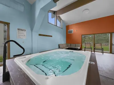 a jacuzzi tub in a room at A308 Lake Cliffe Condo in Dillon