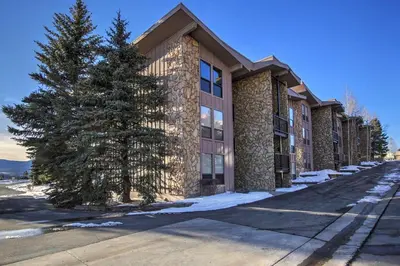 a building with a tree in front of it at A308 Lake Cliffe Condo in Dillon