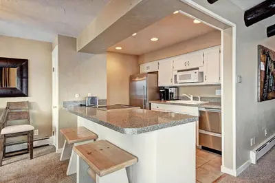 a kitchen with a large island in a room at A308 Lake Cliffe Condo in Dillon