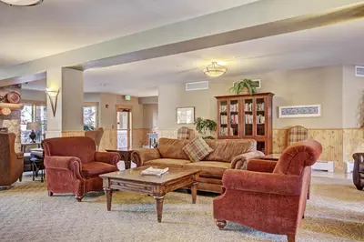 a living room with couches and chairs and a table at 2674 Tenderfoot Lodge Condo in Keystone