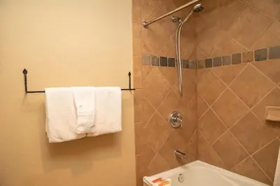 a bathroom with a shower with a white towel at 6532 Settlers Creek Condo in Keystone