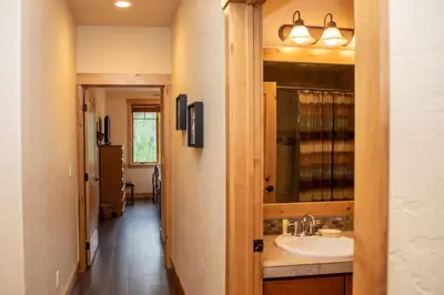 a bathroom with a sink and a mirror at 6506 Settlers Creek Condo in Keystone