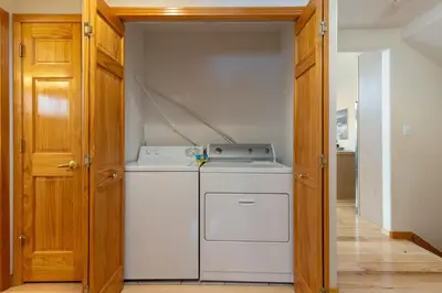 a laundry room with a washer and dryer in it at 130 Meisel Drive Townhouse in Keystone