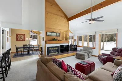 a living room filled with furniture and a fireplace at 1610 Quicksilver Condo in Keystone