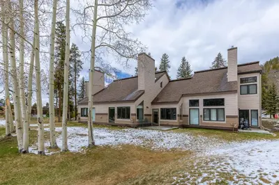 a house with snow in front of it at 1610 Quicksilver Condo in Keystone