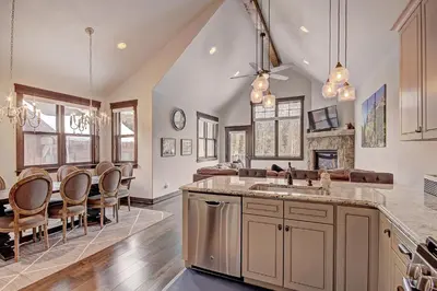 an open kitchen and living room with a dining room at 78 Alders Townhouse with Heated Garage in Keystone