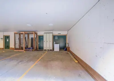 an empty room with doors and a wall at 202 Mill Creek Condo in Keystone