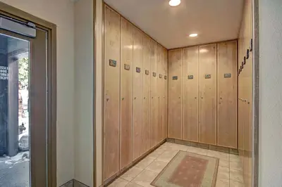 a row of wooden lockers in a room at 1710 the Willows Condo in Snake River Health Services Incorporated Heliport