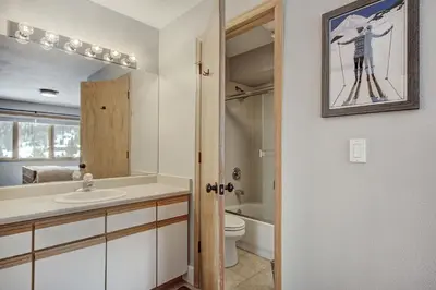 a bathroom with a sink and a toilet at C212 Cinnamon Ridge Condo in Keystone