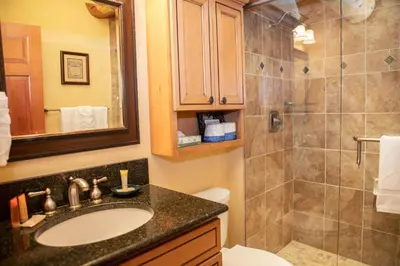 a bathroom with a sink and a shower at 13 Bear Tree Court Condo in Keystone