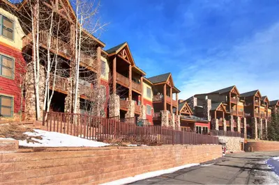 a row of houses being construction on a street at 5983 Hidden River Lodge Condo in Keystone