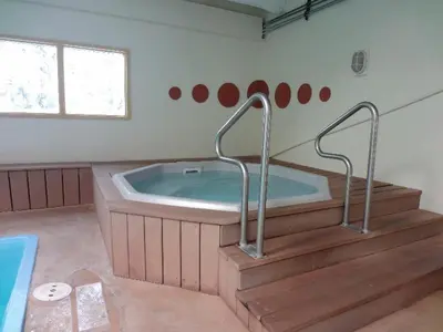 a large bathroom with a tub with two handles at Ten Mile Island 119C Condo in Frisco