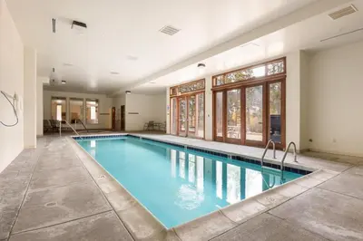 a large swimming pool in a house at 201 Oro Grande Condo in Keystone