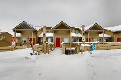 a row of houses in the snow at Wildernest Gore Trail Condo in Silverthorne