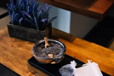 a wooden table with a potted plant and a pot on it at AC Hotel by Marriott Denver Downtown in Denver