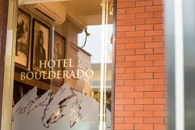 a store window with the hotel bon accordario sign at Hotel Boulderado in Boulder