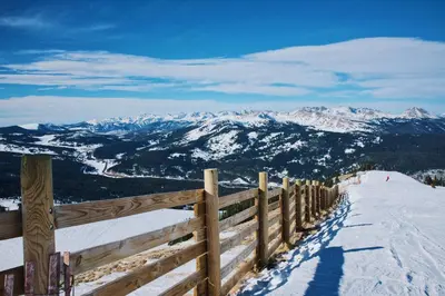 a wooden fence on top of a snow covered mountain at Ten Mile Creek Condo: Downtown Frisco, Hot Tub in Frisco