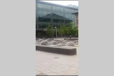 a water fountain in front of a building at Airport Lay Over in Denver