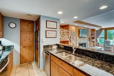 a kitchen with a sink and a counter top at Decatur 1779 in Keystone