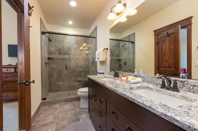 a bathroom with a sink and a shower at 47B River Run Townhomes in Keystone