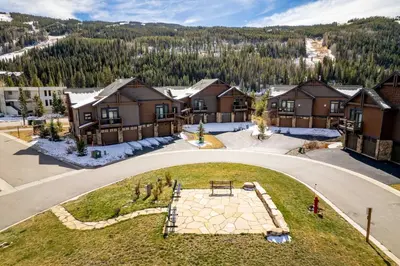 an aerial view of a house with a golf course at 47B River Run Townhomes in Keystone