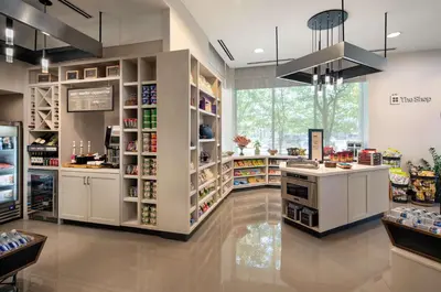 a grocery store with a counter in a room at Hilton Garden Inn Denver/Cherry Creek in Denver