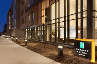 a building with a sign in front of it at Embassy Suites By Hilton Boulder in Boulder