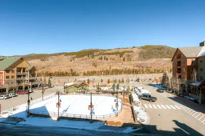 an ice rink in a parking lot in a town at Dakota Lodge 8513 in Keystone