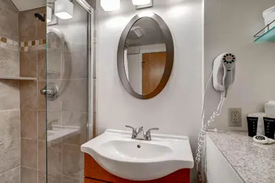 a bathroom with a sink and a shower at Plaza 1407 in Keystone