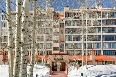 a building with trees in front of it at Decatur 1775 in Keystone