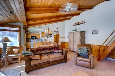 a living room with a couch and two chairs at Decatur 1775 in Keystone