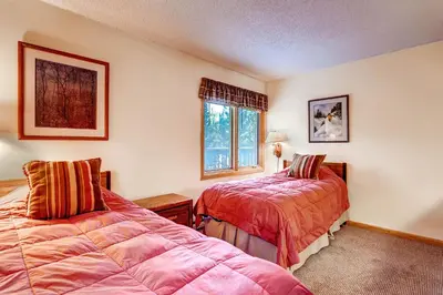 a bedroom with two beds and a window at Key Condo 2950 in Keystone