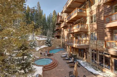 an aerial view of a resort with a swimming pool at Timbers 3060 in Keystone