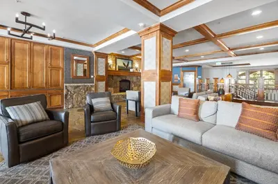 a living room with a couch and a table at Lone Eagle 3008 in Keystone