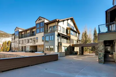 a large apartment building with a large courtyard at Slopeside 2741 in Keystone