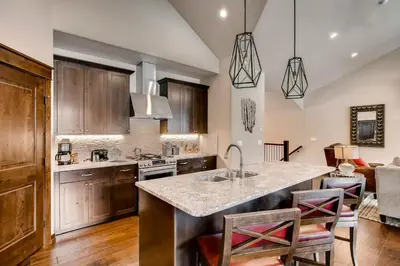 a kitchen with a sink and a counter top at River Run Townhome RR37 in Keystone
