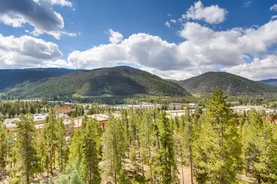an aerial view of a town with mountains in the background at Sts, Johns 2541 in Keystone