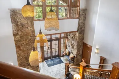 an overhead view of a hallway with hanging pendant lights at Lone Eagle 3031 in Keystone