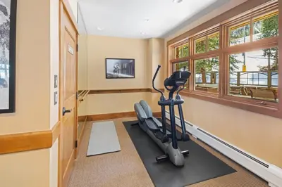 a gym with a treadmill and a exercise bike at Lone Eagle 3031 in Keystone