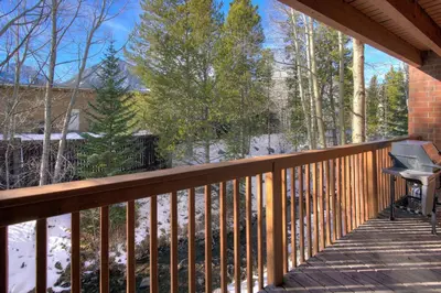 a balcony of a house with snow on the ground at Lagoon 762B Townhouse in Frisco