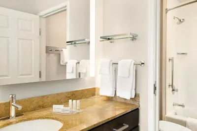 a bathroom with a sink and a mirror at Residence Inn Denver City Center in Denver