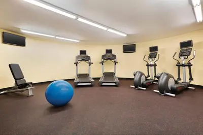 a gym with a blue ball in a room at TownePlace Suites by Marriott Denver Downtown in Denver
