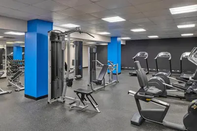 a gym with treadmills and cardio machines at Courtyard by Marriott Denver Downtown in Denver