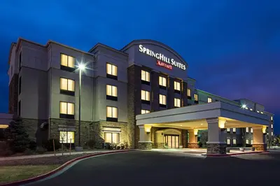 a hotel with a sign on the front of it at SpringHill Suites by Marriott Denver Airport in Denver