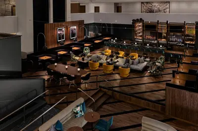 an overhead view of a restaurant with tables and chairs at Renaissance Denver Hotel & Conference Center in Denver