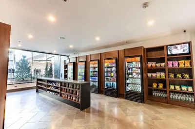 a grocery store aisle with shelves of food at Renaissance Denver Hotel & Conference Center in Denver
