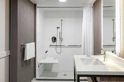 a bathroom with a sink and a shower at SpringHill Suites Denver North / Westminster in Westminster